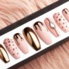 Rose gold press on nails with drips and Swarovski rhinestones